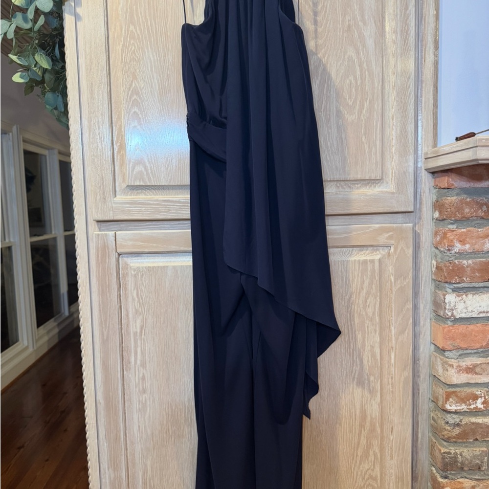 Like New!Trina Turk Halter chiffon overlay, flared leg jumpsuit size 6.